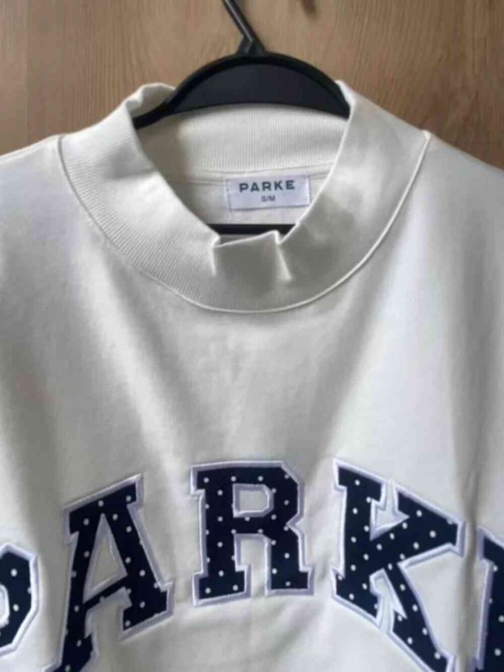 šWhite Mock Neck Sweatshirt | Parke Dotted Navy Applique Logo - Picture 4 of 6